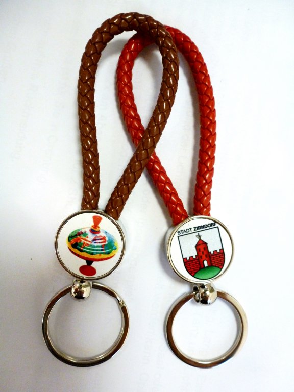 Schlüsselanhänger mit Wappen und Kreisel